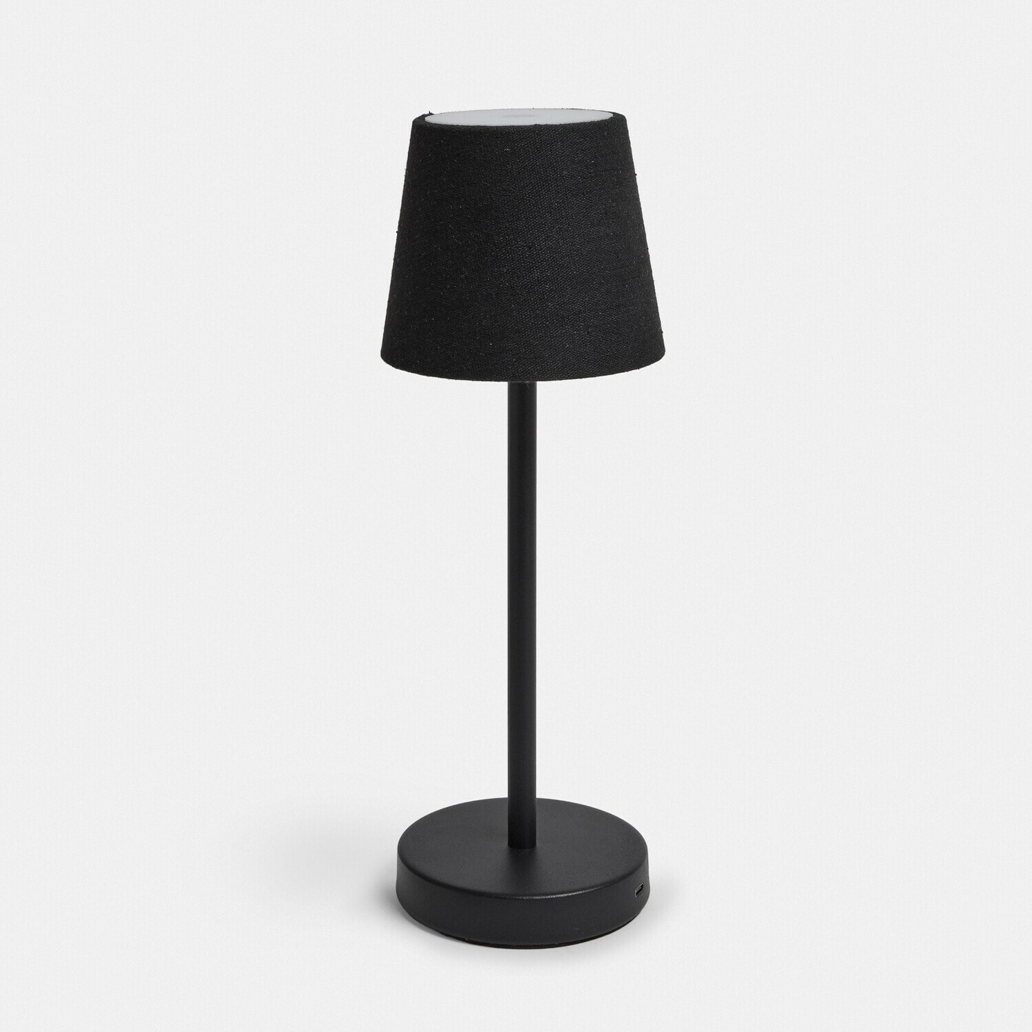 Moderne schwarze Tischlampe mit Metallfuß und Stoffschirm für stimmungsvolle Innenbeleuchtung