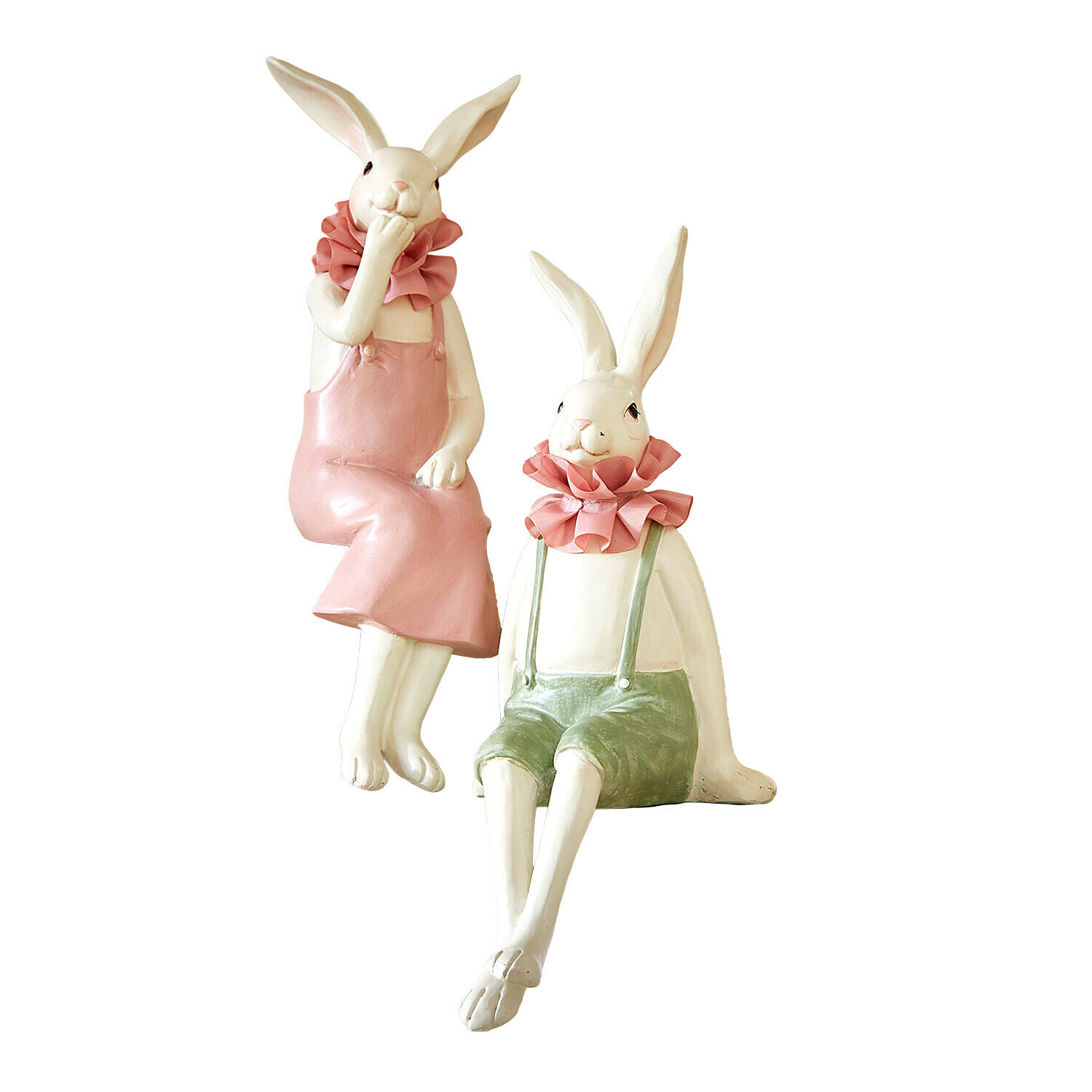Zwei dekorative Keramik-Hasenfiguren in pastellfarbenen Kleidern mit rosa Rüschenkragen