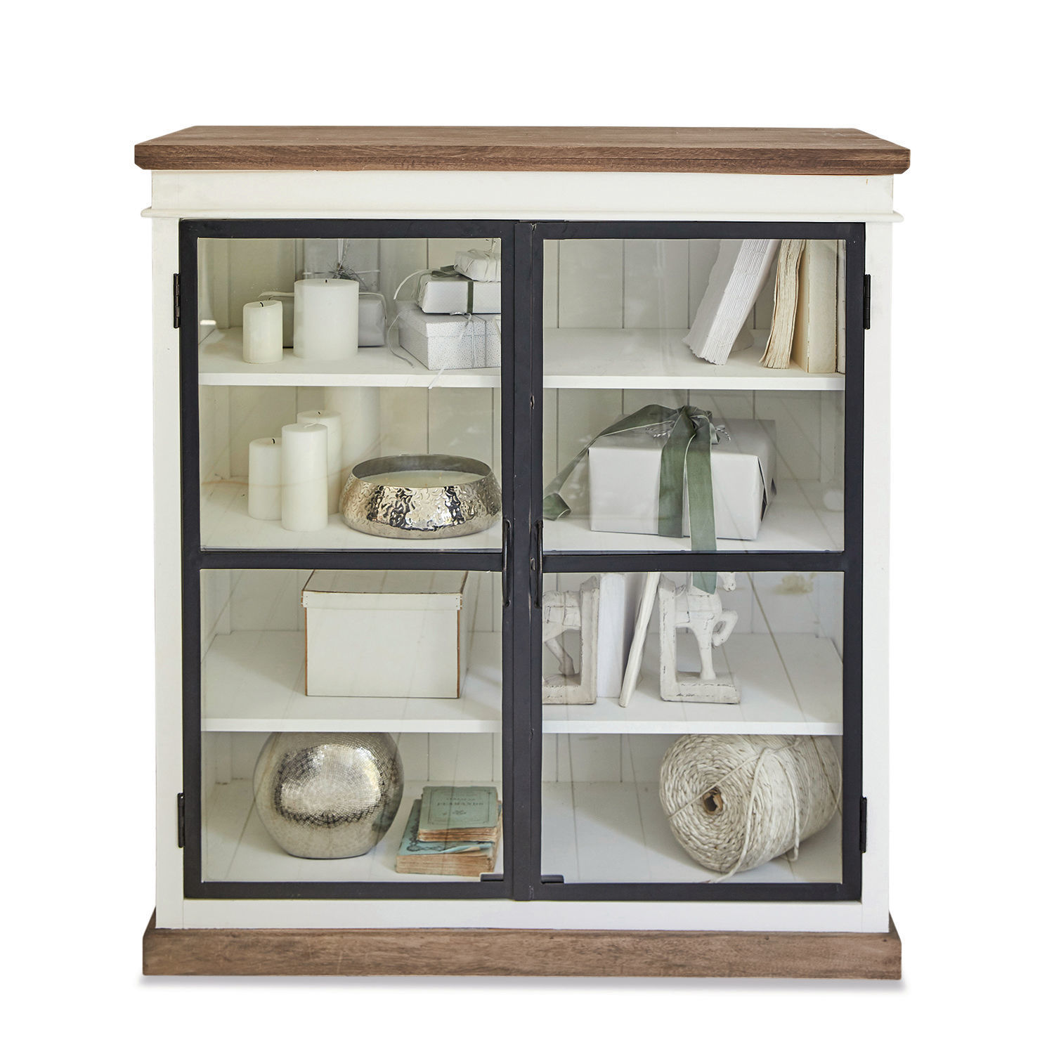 Kommode Mira Weiße Holzvitrine mit dunkler Holzplatte und Glastüren, Dekorationen und Bücher innen