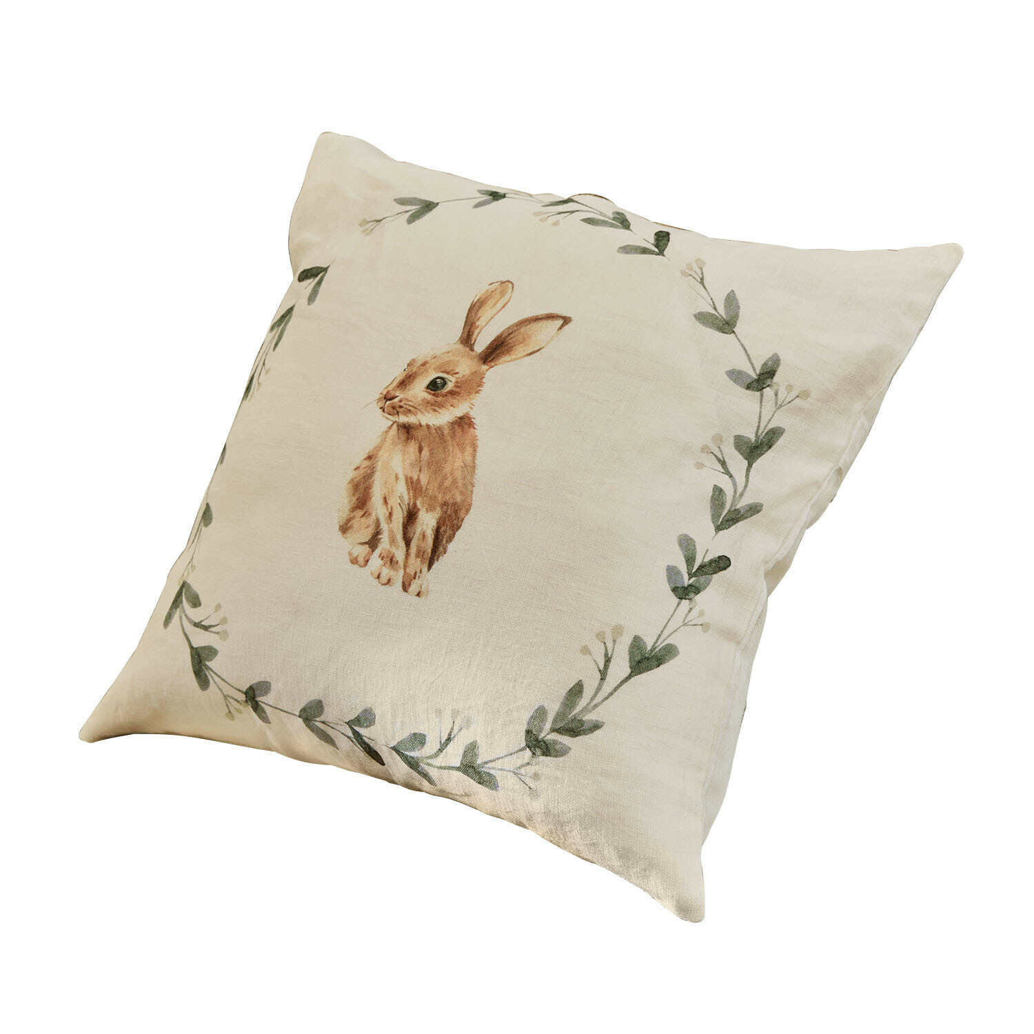 Beiges Kissen mit braunem Hasenmotiv und grünem Blätterkranz, dekoratives Wohnaccessoire