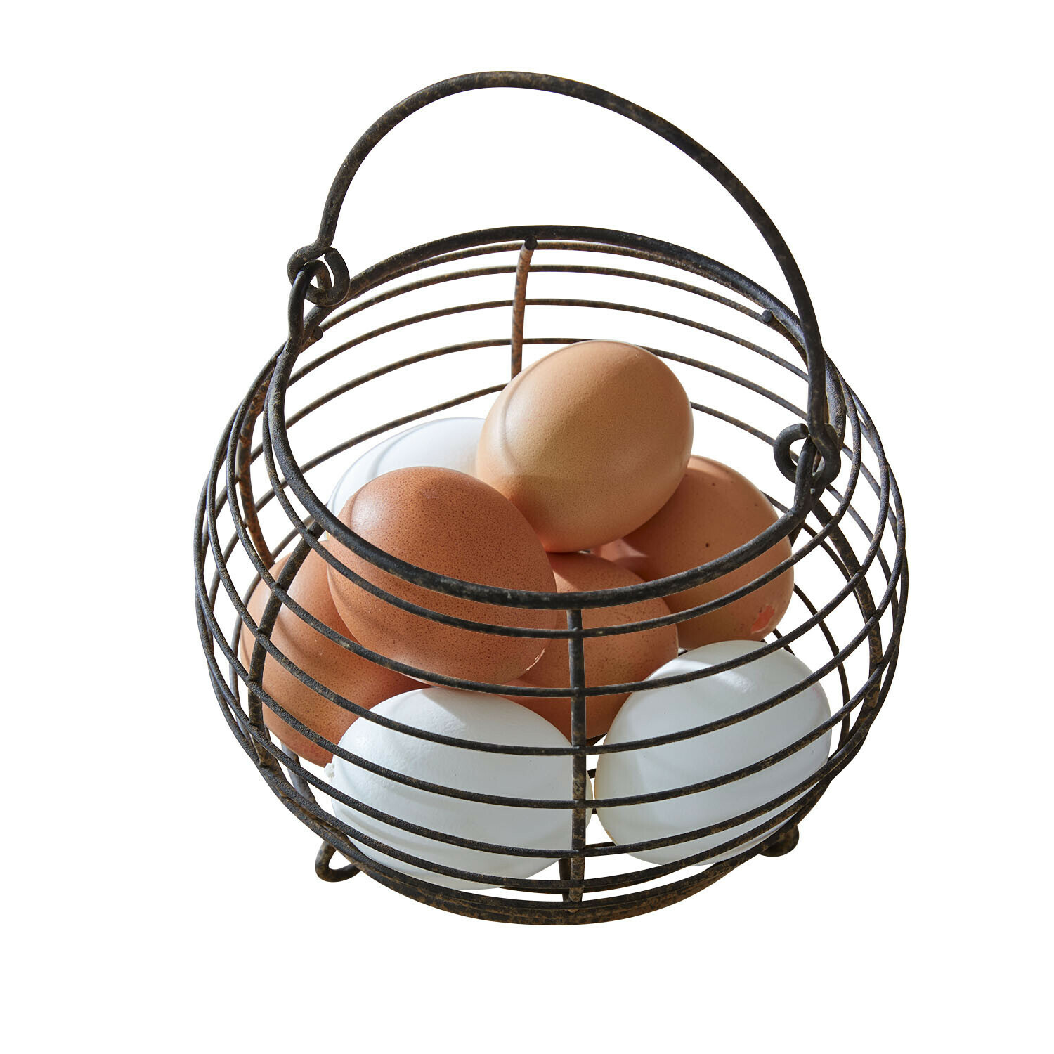 Metallkorb mit Griff für braune und weiße Eier im rustikalen Design