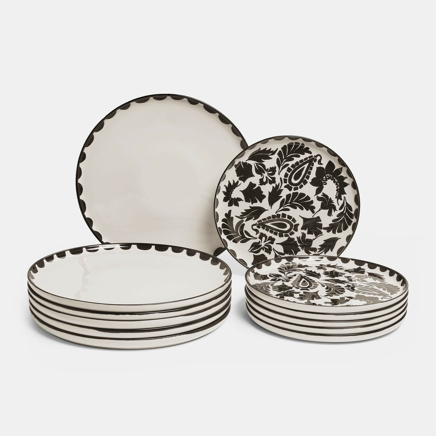 Teller 12er Set Tazira Set aus schwarzen und weißen Keramiktellern mit dekorativem Muster und glatten Rändern