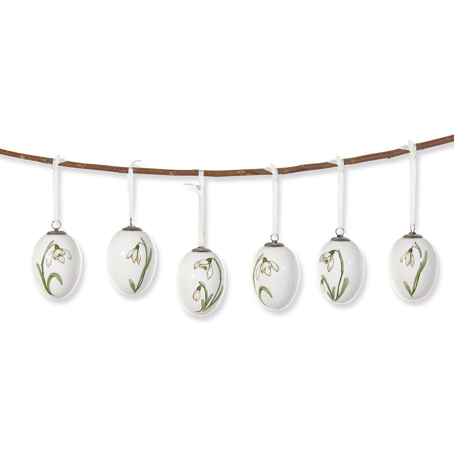 Osterei 6er Set Willmare Set aus sechs weißen Keramikeiern mit grünen Blumen, an einem Ast hängend, Frühlingsdekoration