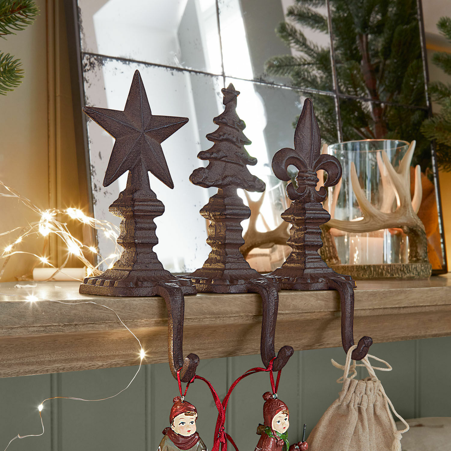 Haken 3er Set Lorencio Drei braune dekorative Haken aus Gusseisen in Form von Stern, Tannenbaum und Lilie