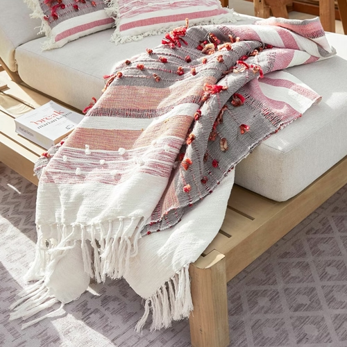 Dekorativer Baumwollplaid in Weiß, Rosa und Grau mit Fransen und Quasten, ideal fürs Wohnzimmer