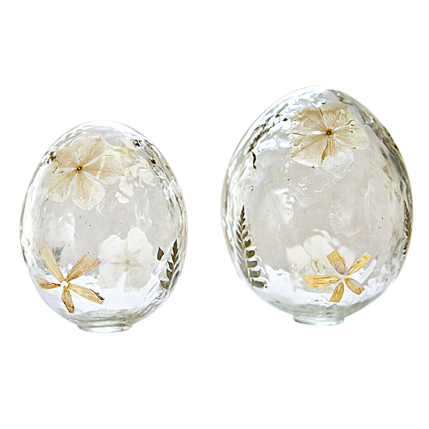 Zwei transparente Glaseier mit eingearbeiteten getrockneten Blumen und Blättern, Frühlingsdeko