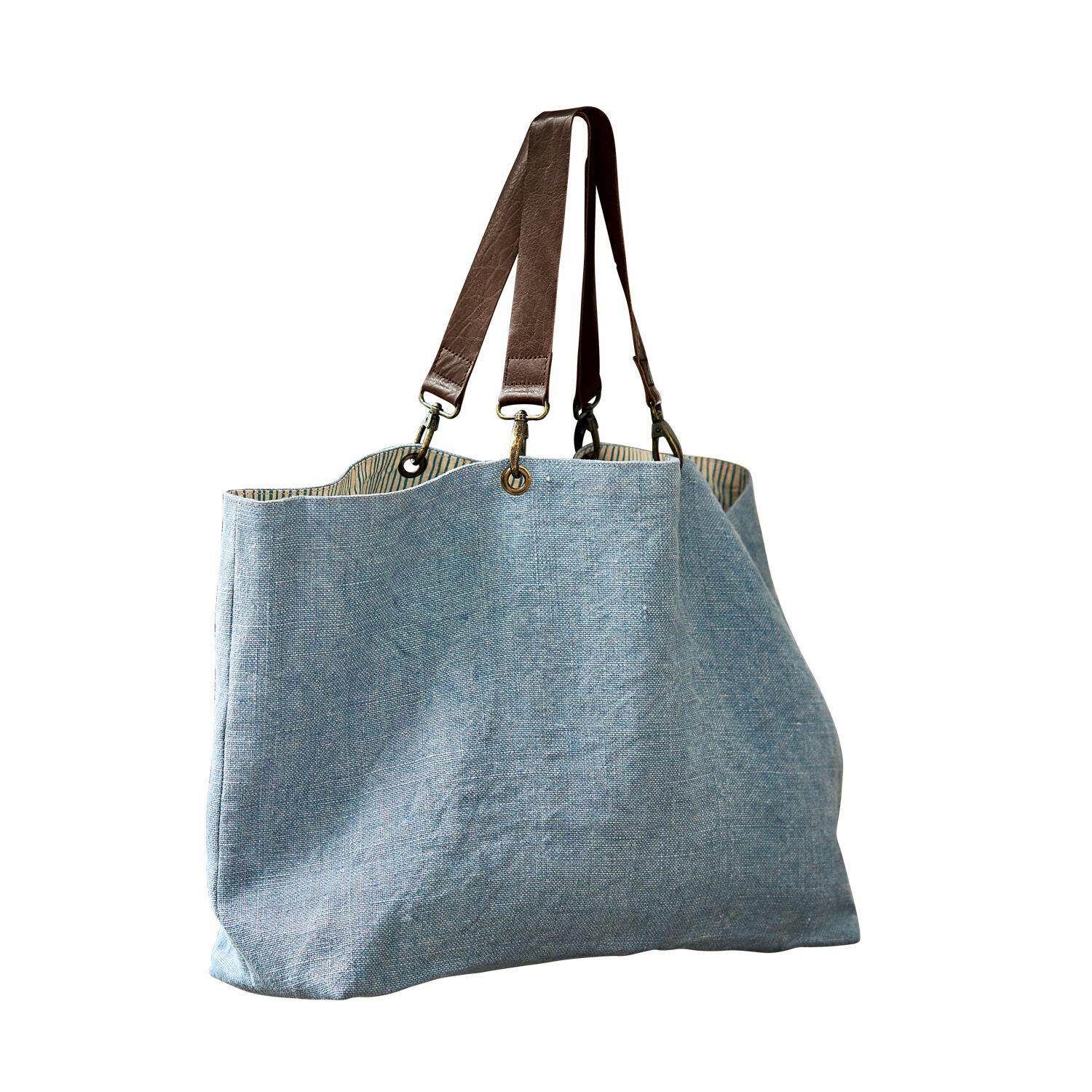 Tasche Bente Große Tasche aus hellblauem Leinen mit braunen Ledergriffen, praktische Einkaufstasche