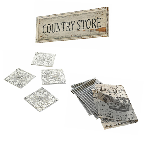 Holzschild Country Store mit grauen Untersetzern und Leinen-Geschirrtüchern für die Küche