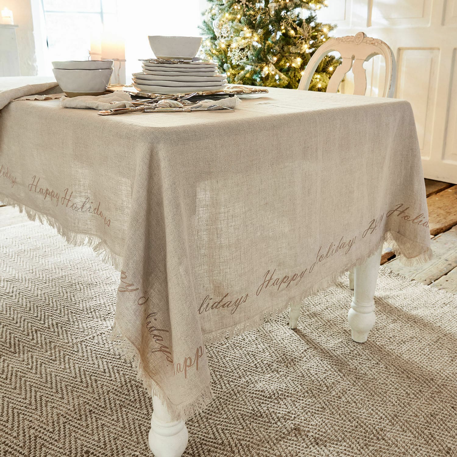 Tischdecke Emilia Leinen-Tischdecke in Naturfarbe mit Schriftzug Happy Holidays, festliche Tischdekoration