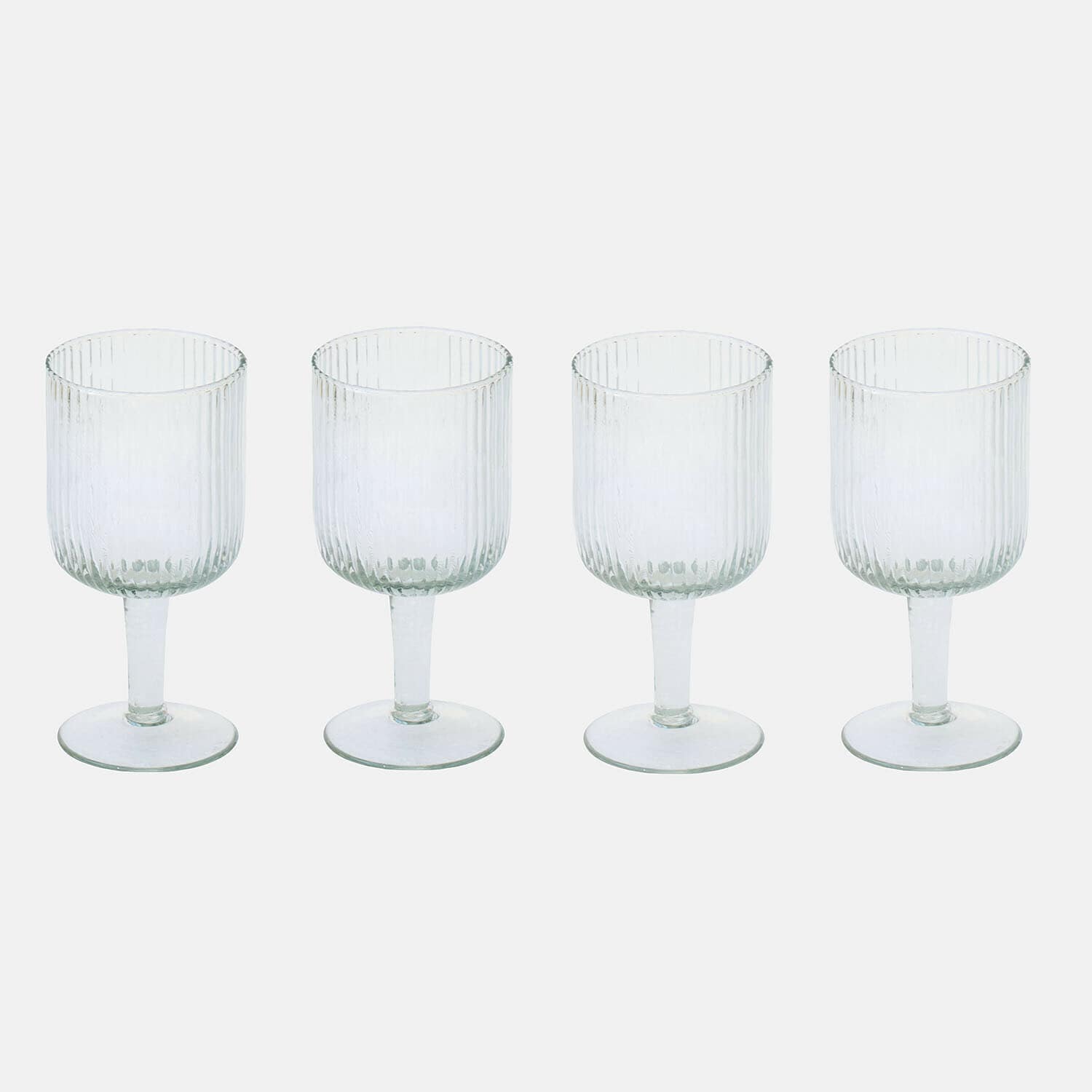 Glas 4er Set Caleza Set aus vier transparenten Gläsern mit Fuß und vertikaler Rillenstruktur, Trinkglas