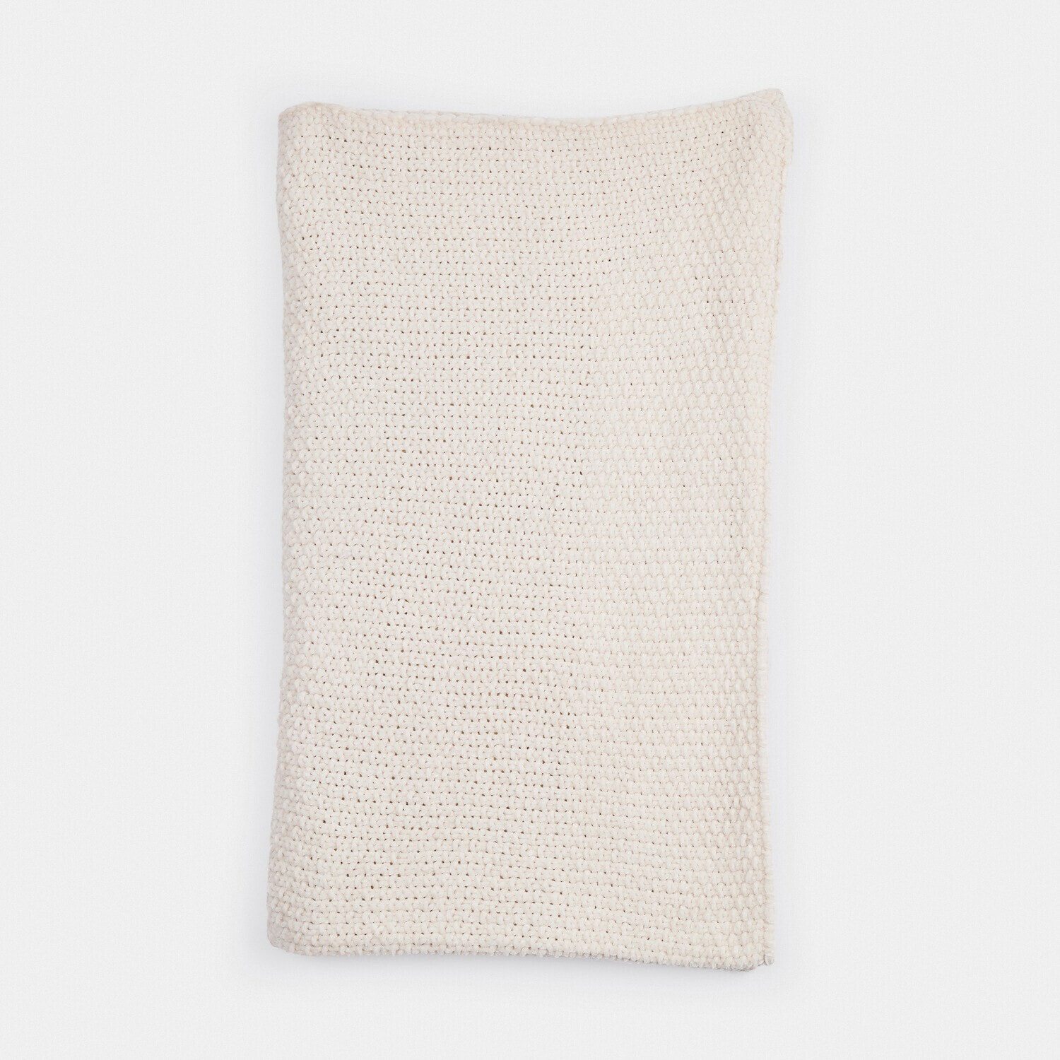 Handgestrickte cremefarbene Decke aus weicher Wolle, ideal für gemütliche Wohnräume und Dekoration
