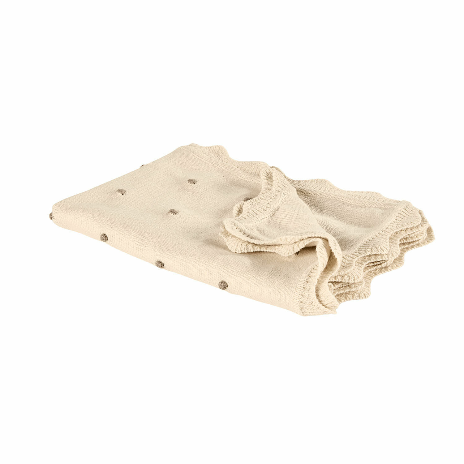Beige gestrickte Decke mit hellbraunen Punkten und welligem Rand, weiches Material.