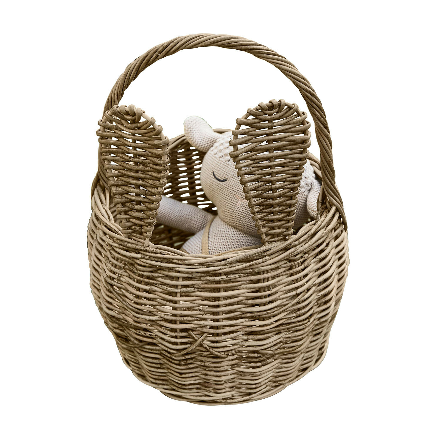 Naturfarbener Korb aus Weide in Hasenform mit Ohren und weichem Stofftier innen