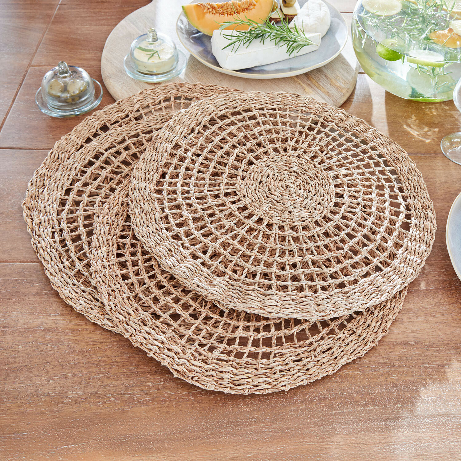 Platzset 4er Set Sauvrelle Set aus drei runden Tischsets aus natürlichem geflochtenem Material in Beige für den Esstisch