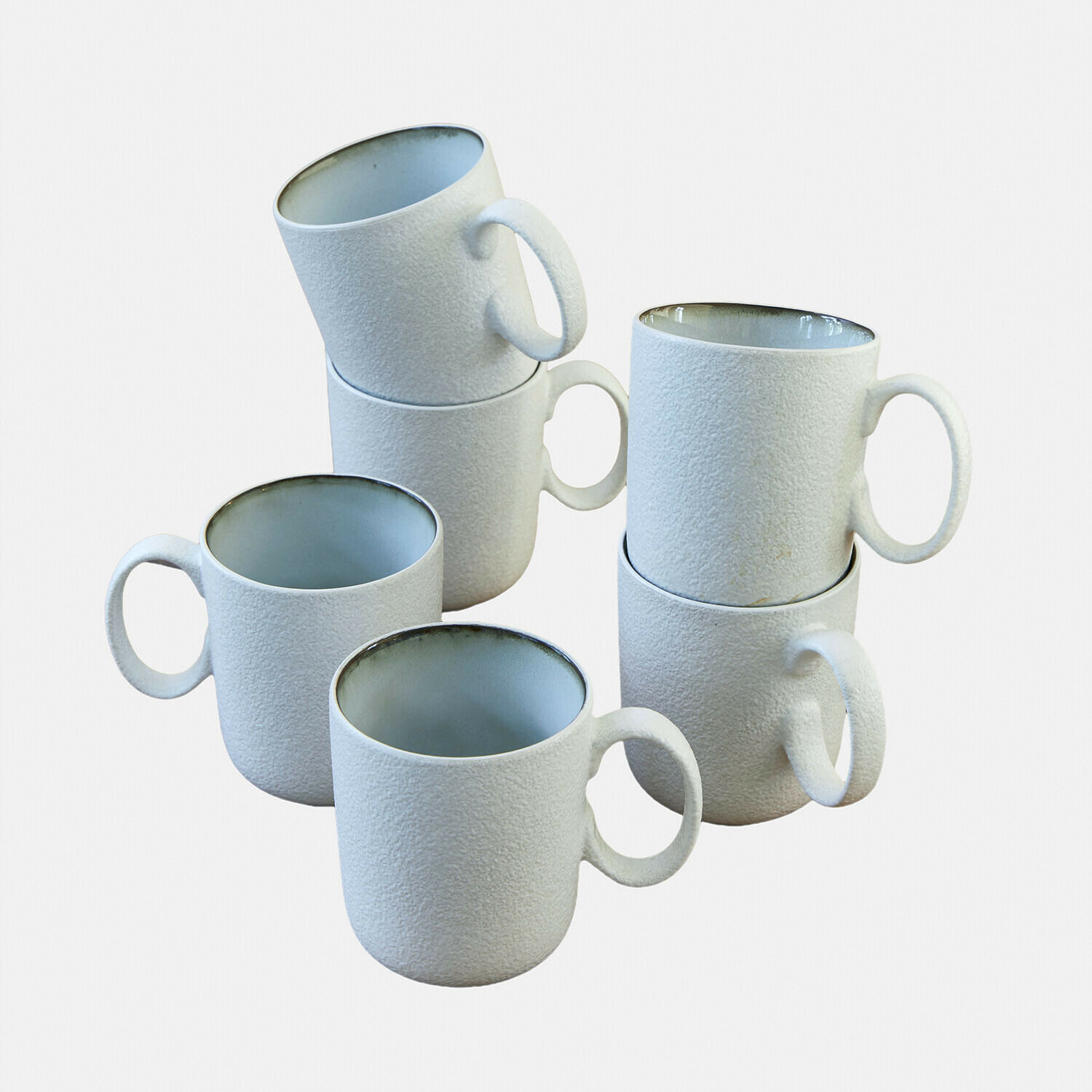 Tasse 6er Set Eiruna Set aus sechs weißen Keramiktassen mit rauer Oberfläche und grauem Innenraum für Kaffee und Tee