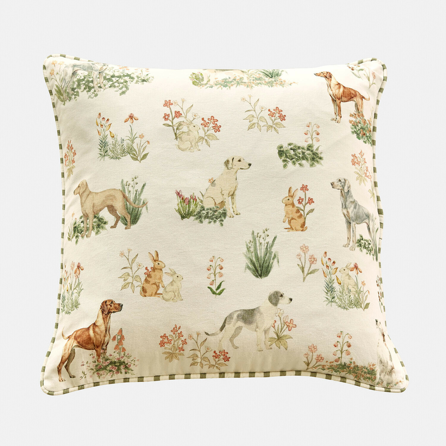 Dekoratives Baumwollkissen in Creme mit Hund-, Hasen- und Blumenmotiven für gemütliche Räume
