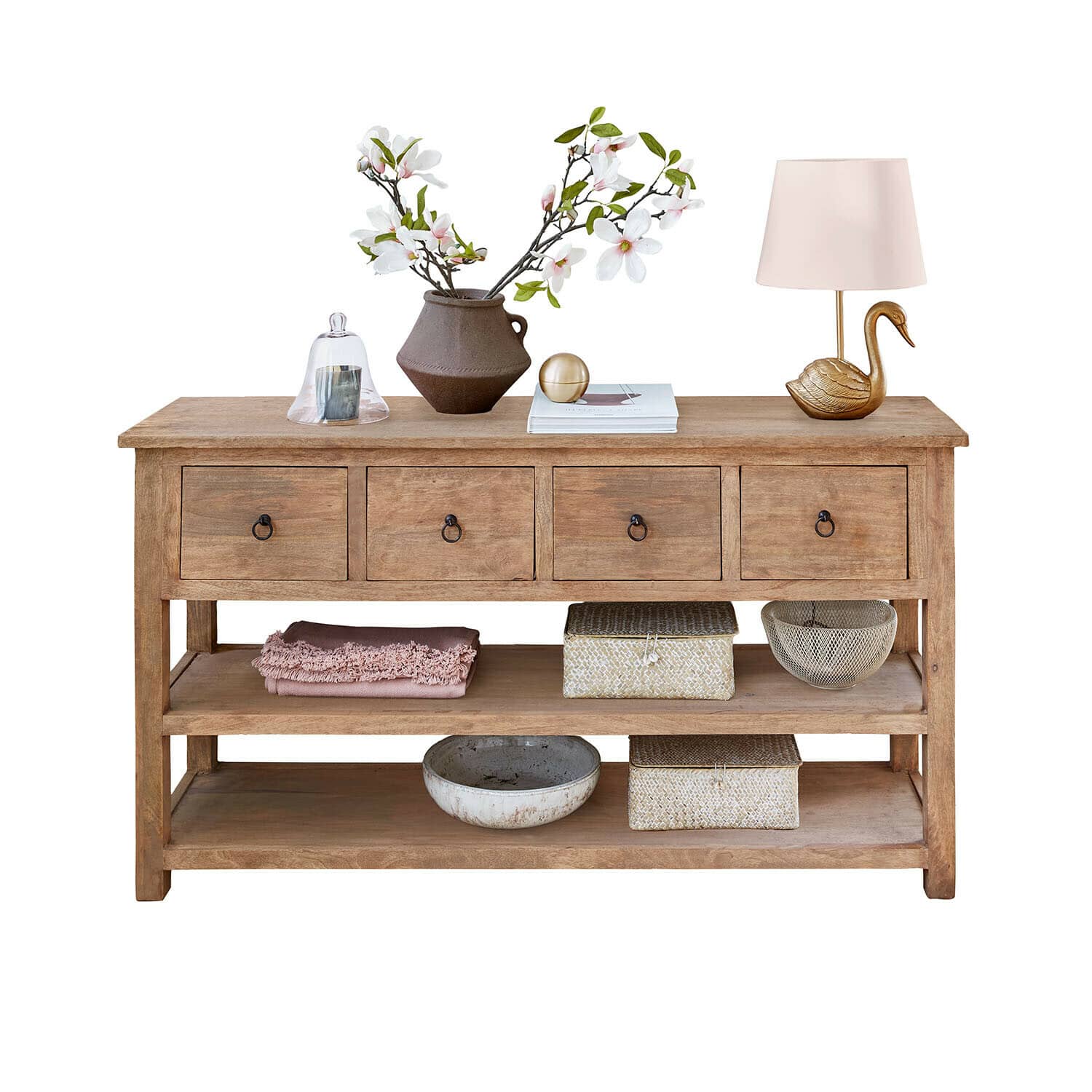 Holzkonsole mit vier Schubladen, dekorativer Lampe und Vase mit weißen und rosa Blüten