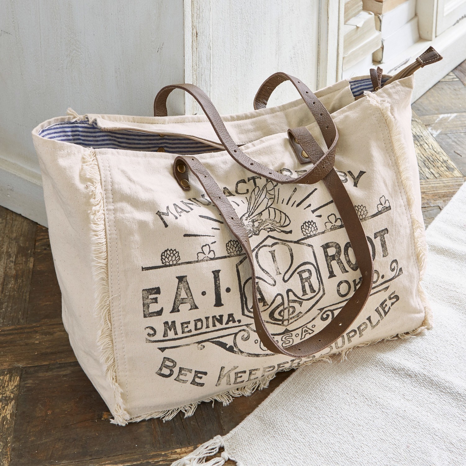 Tasche Cloe Beige Baumwolltasche mit braunen Ledergriffen und Bienenmotiv, praktische Einkaufstasche