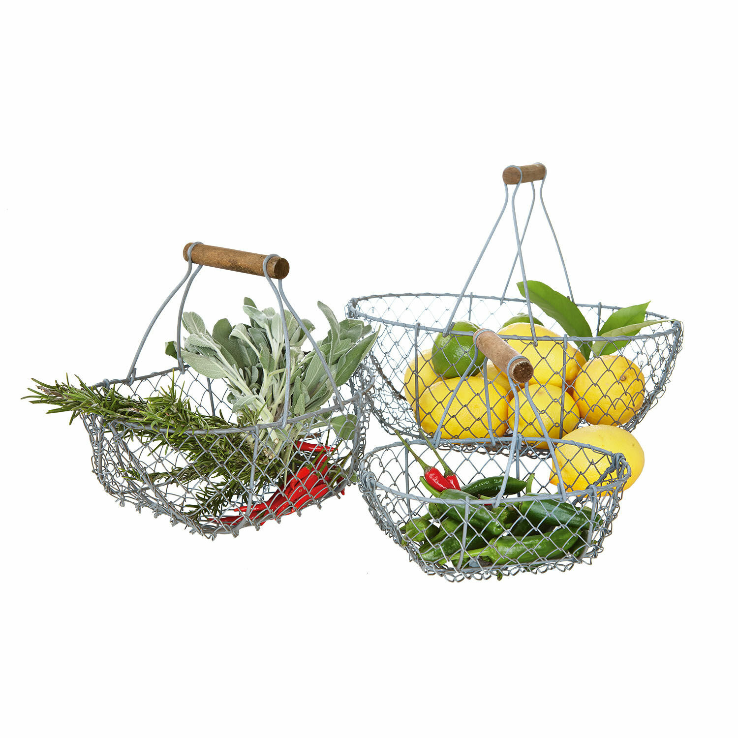 Drahtkorb 3er Set Baker Drei Drahtkörbe mit Holzgriffen gefüllt mit Zitronen, Chili und frischen Kräutern