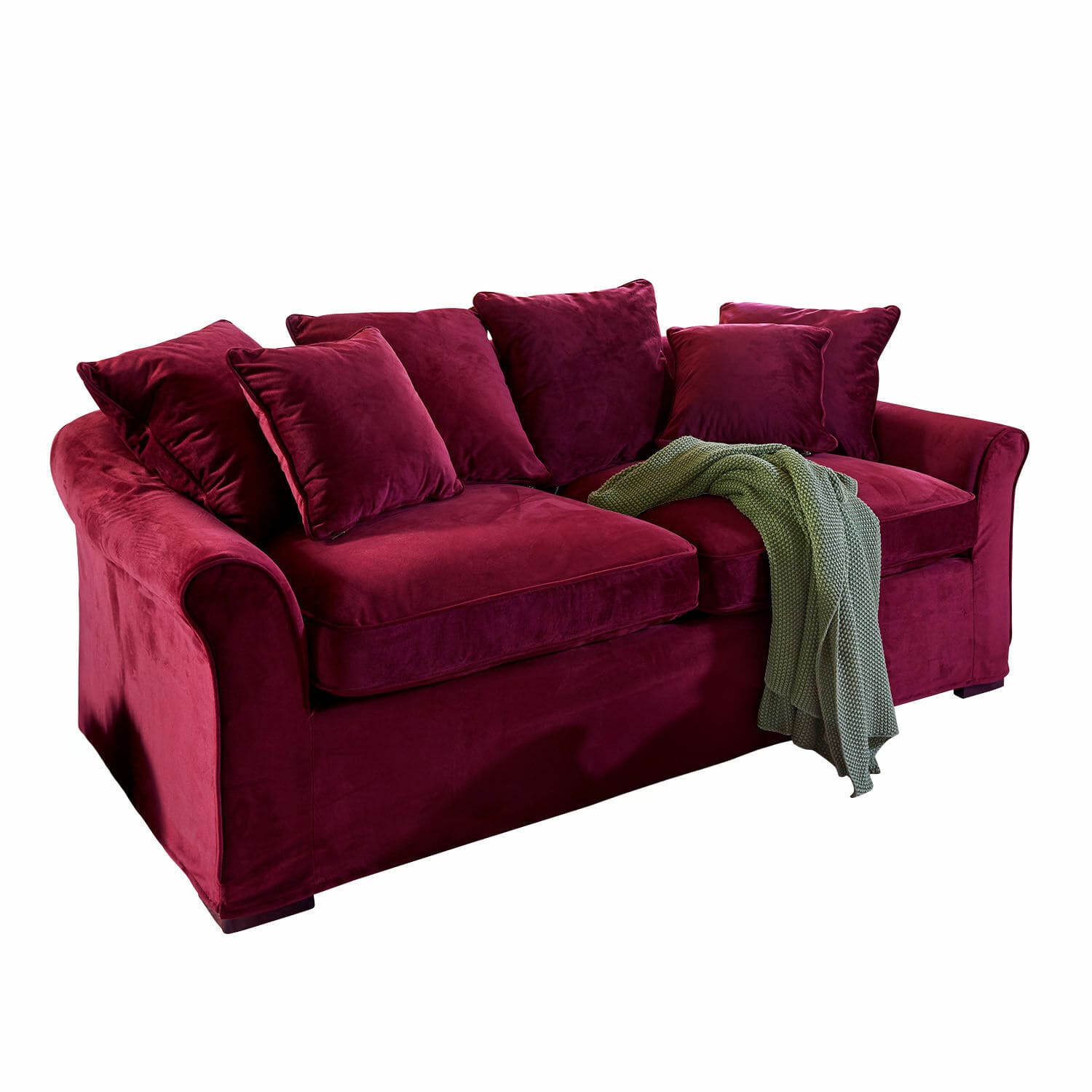 Bordeauxrotes Samtsofa mit Kissen und grünem Strickplaid, gemütliches Wohnzimmermöbel