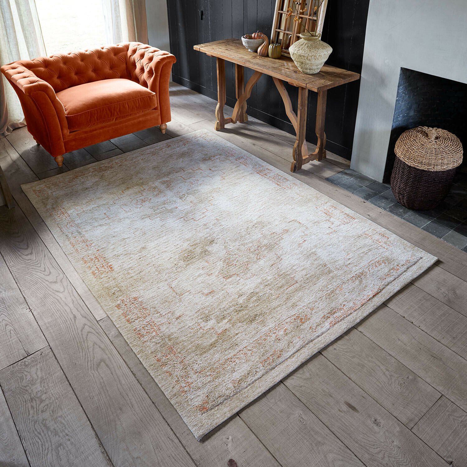 Teppich Soravitto Heller Teppich mit dezentem Muster in Beige und Orange auf Holzboden im Wohnzimmer