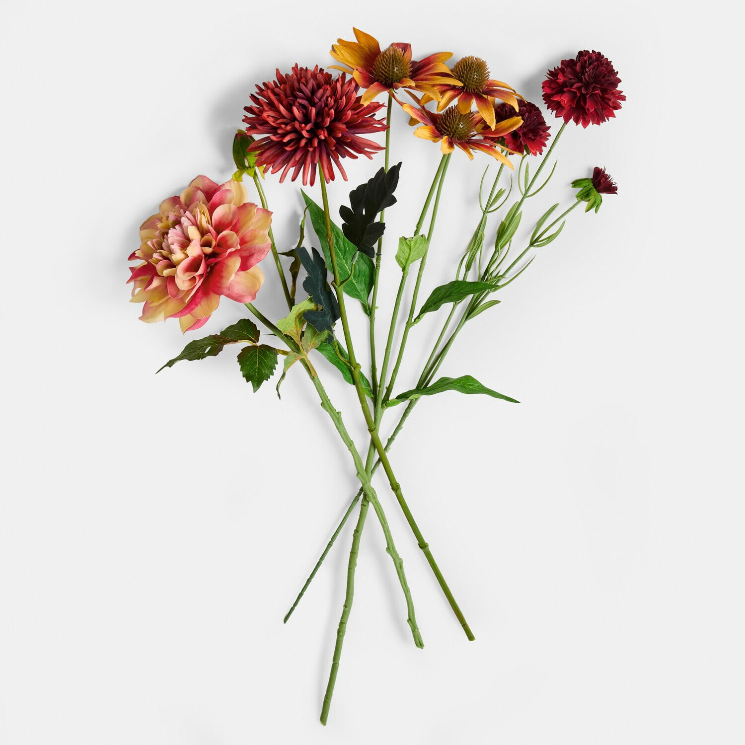 Kunstblume 4er Set Zévrine Strauß künstlicher Blumen in Rot- und Gelbtönen mit grünen Blättern auf weißem Hintergrund