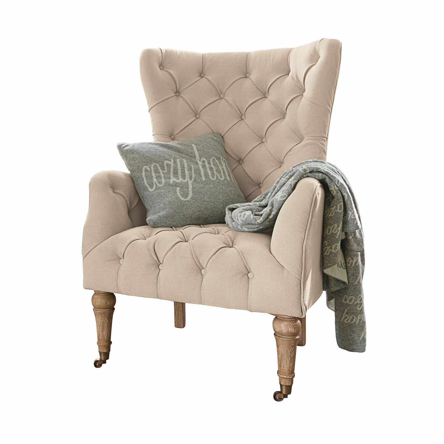 Sessel Migré Beiger, gepolsterter Sessel mit Holzbeinen, grauem Kissen und Decke cozy home