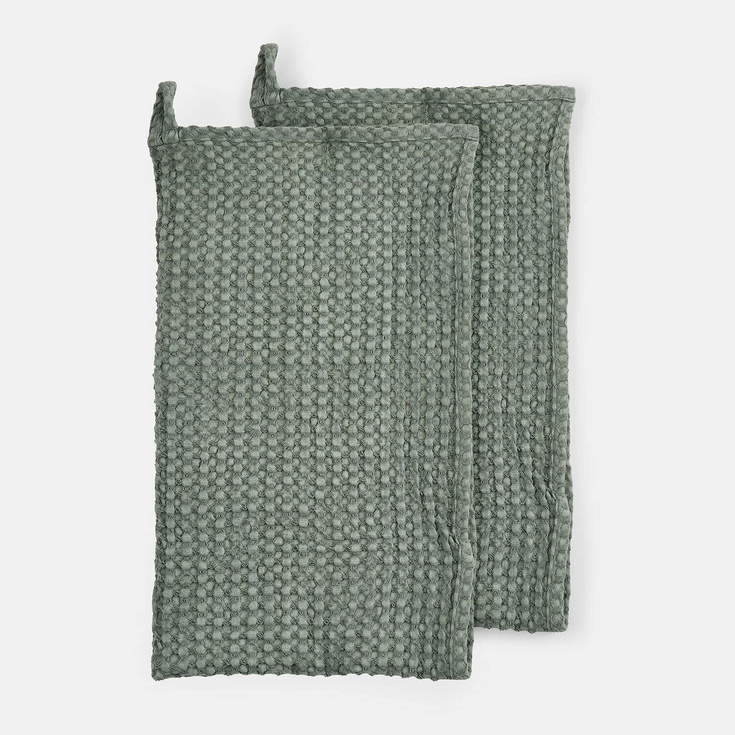 Set aus zwei grünen Baumwoll-Topflappen mit Waffelstruktur zum Schutz der Hände in der Küche
